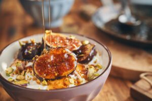 Yogurt with Caramelized Figs, Pistachio and Honey for Breakfast