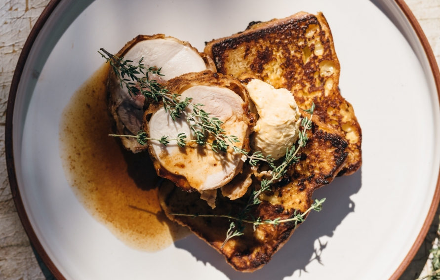 Buttermilk Fried Chicken Stuffed with White Cheddar on Brioche French Toast