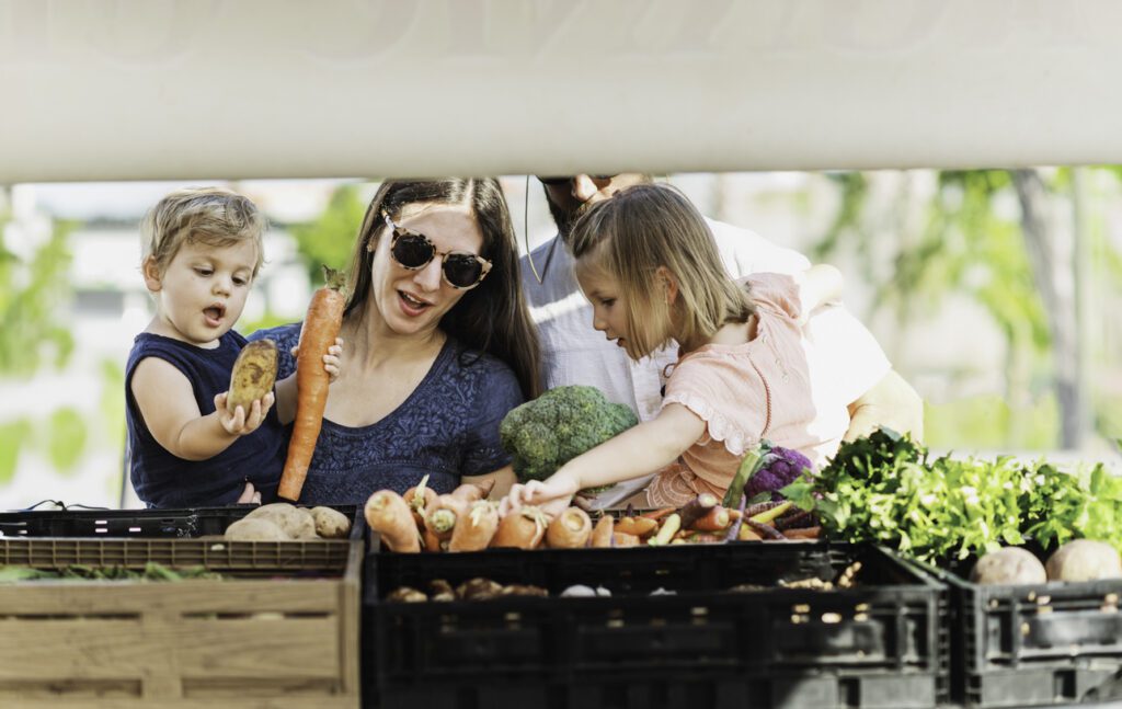 Children and family at a farmers market